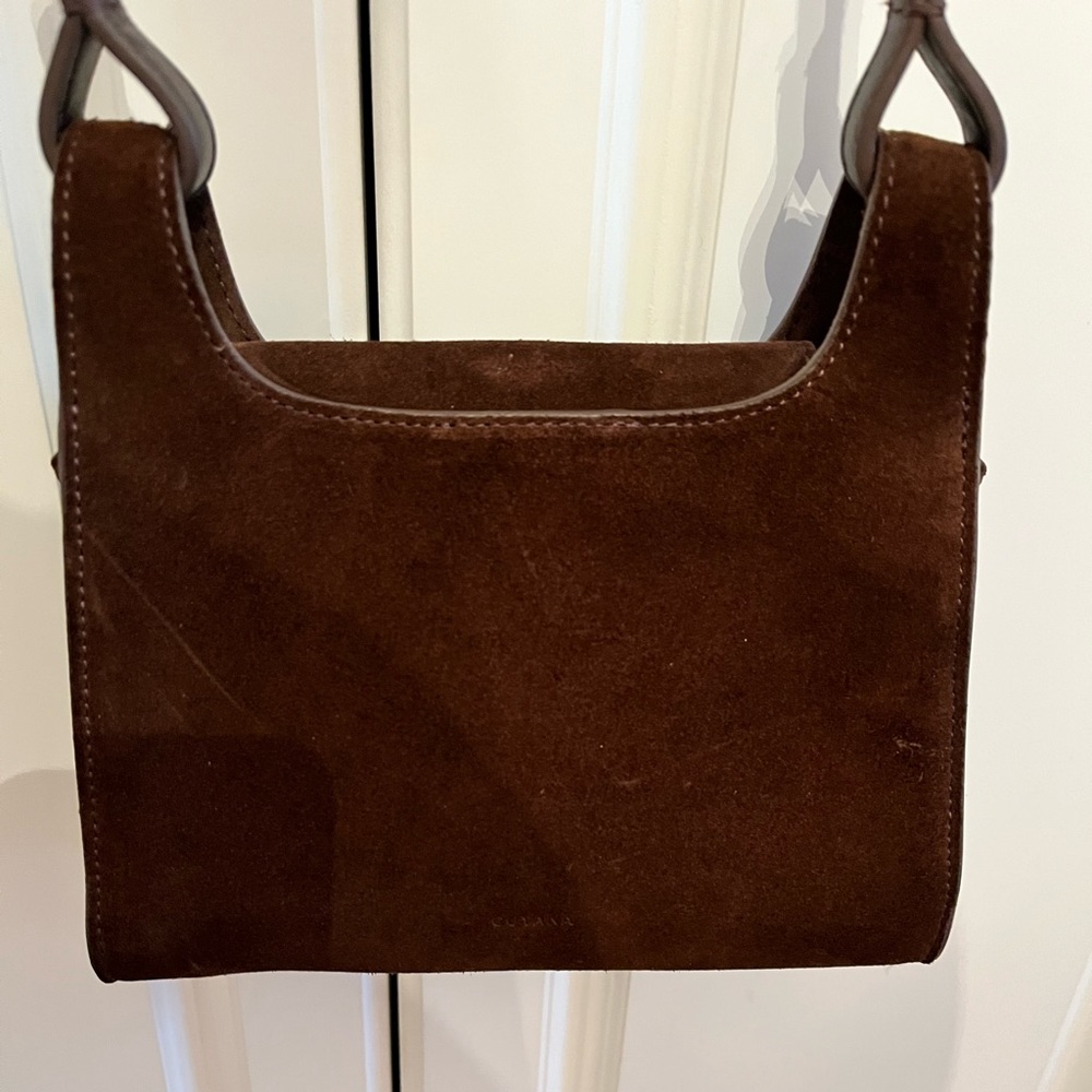 Brown suede Cuyana mini double loop bag.